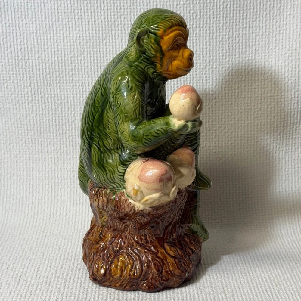 Antique Collectible Monkey Holds Fruits and Water bag.